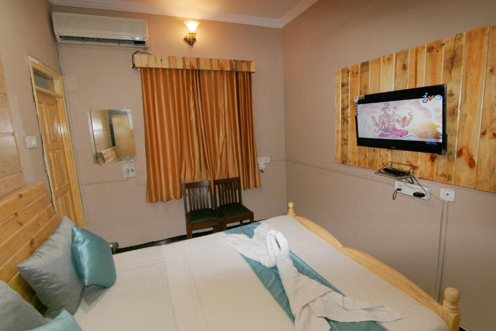 Bedroom with AC at Casa Inn