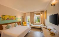 Bedroom with TV at Heritage Village Resort