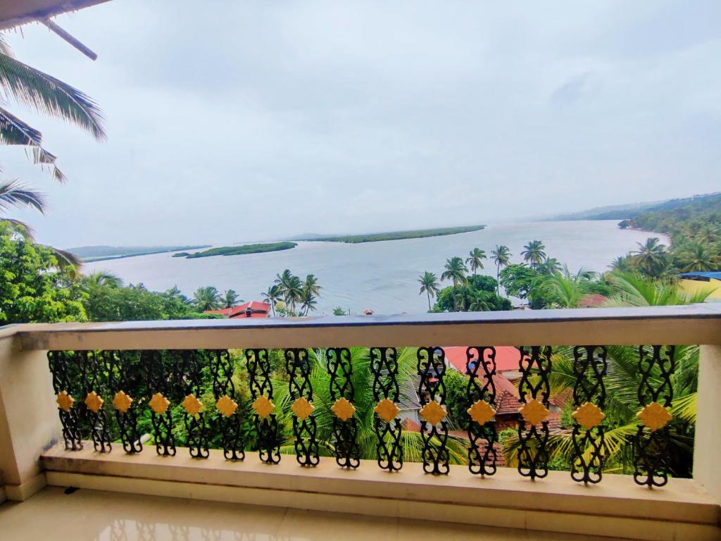 Patio with beach view at Hotel Ekaar