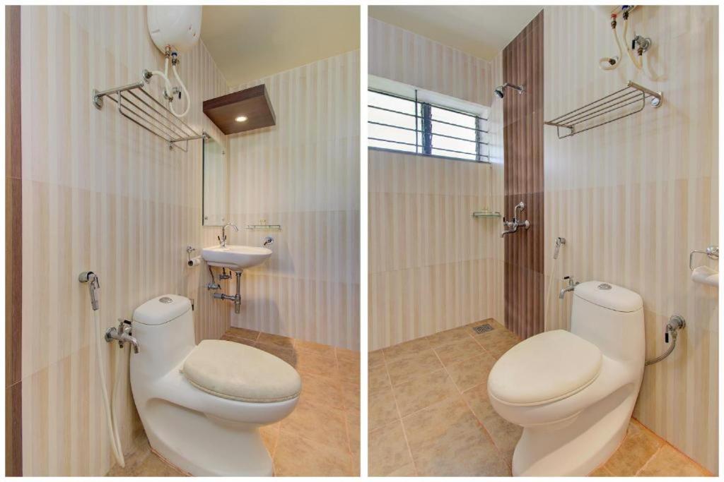 Bathroom with shower at Hotel Xec Residency