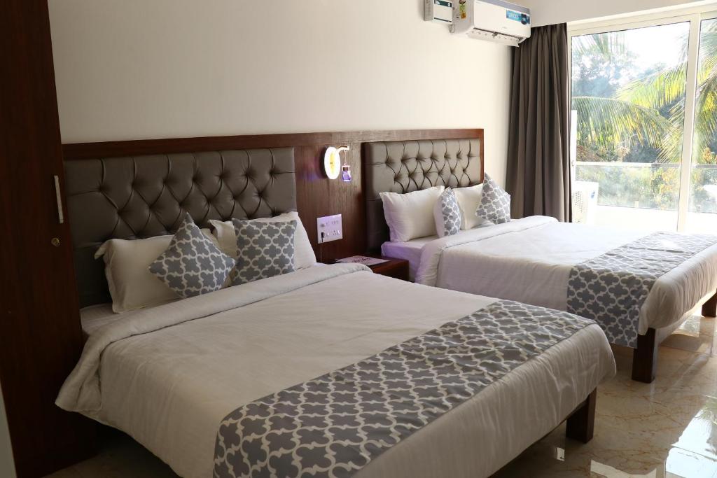 Twin bed at La Vera Boutique Hotel