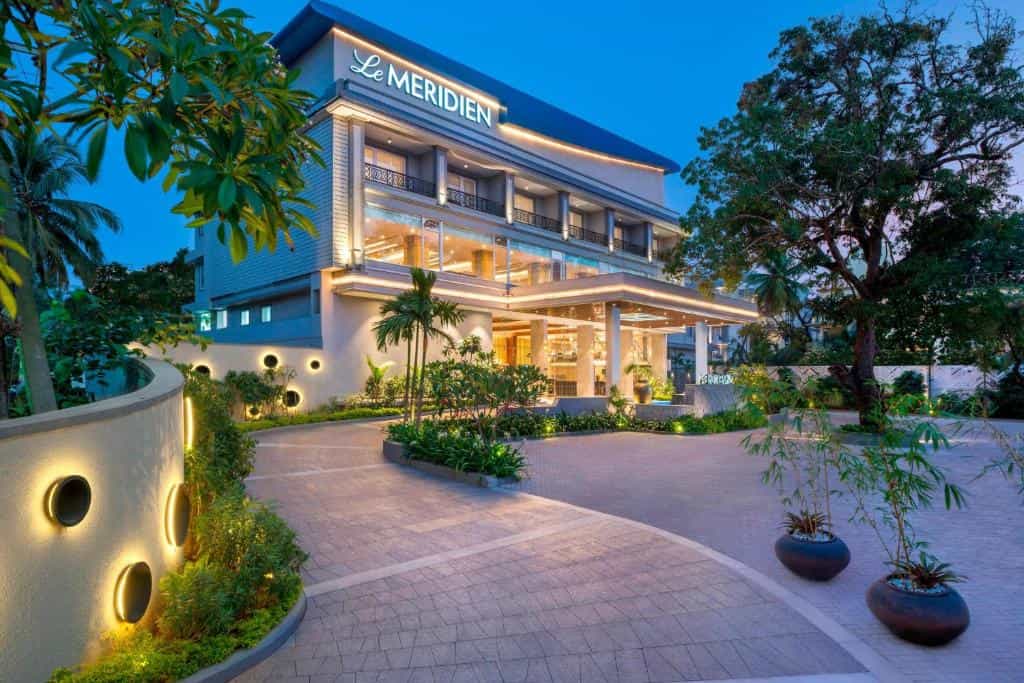 5 star hotel exterior with patio at Le Meridien in Calangute
