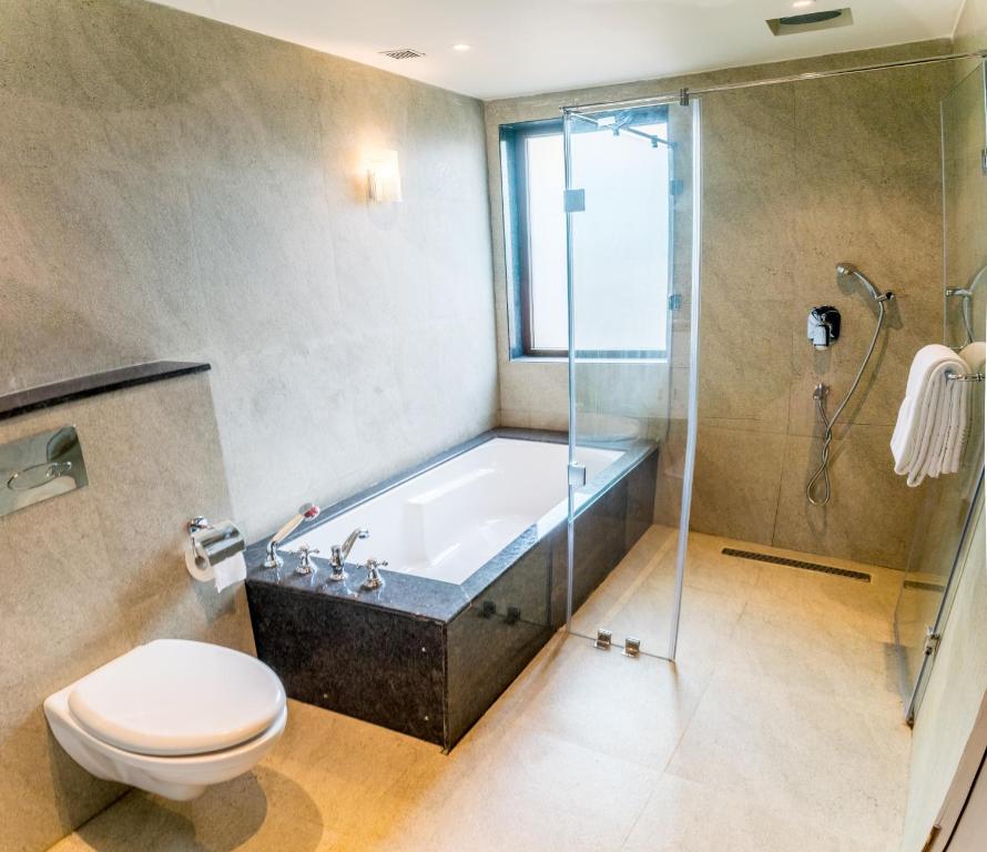 Shower with private pool at The Ivy Anjuna