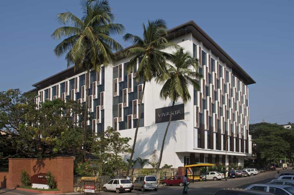 5 star hotel exterior with car parking view at Vivanta Goa in Panaji